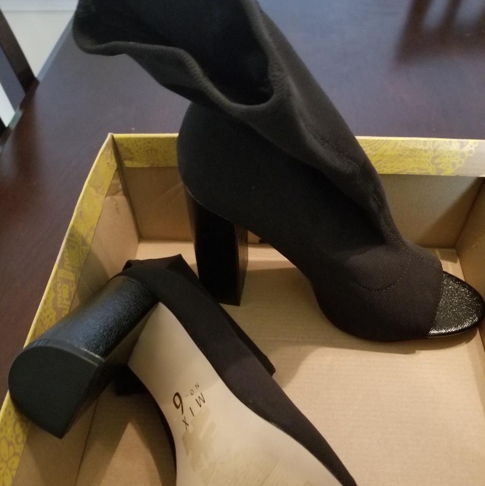 Black opened toe booties